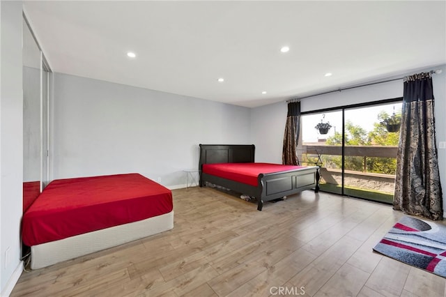 5533 Edward E Horton Ln Unit 6, Encino, CA 91316 - bedroom featuring wood finished floors, access to exterior, and recessed lighting