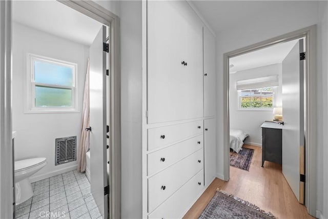 6335 Lorca Dr, San Diego, CA 92115 - bathroom featuring heating unit and shower / bath combo with shower curtain