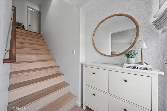 6335 Lorca Dr, San Diego, CA 92115 - stairs featuring wallpapered walls and baseboards