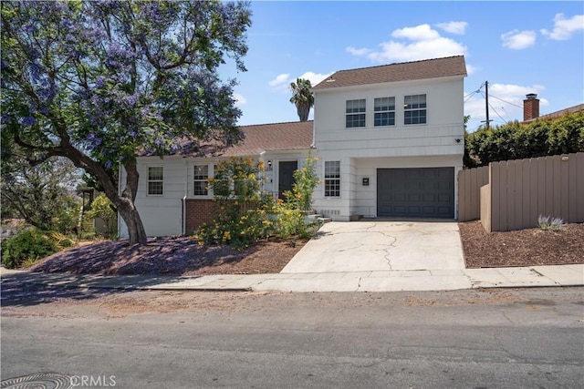 6335 Lorca Dr, San Diego, CA 92115 - view of front of home featuring an attached garage, concrete driveway, and roof with shingles