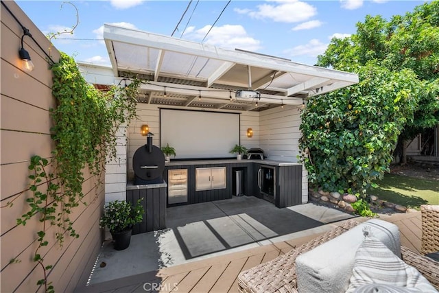 6335 Lorca Dr, San Diego, CA 92115 - deck featuring exterior kitchen and a patio
