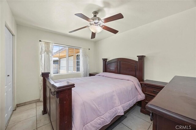 2616 Lynwood St, Bakersfield, CA 93306 - bedroom featuring light tile patterned floors and a ceiling fan