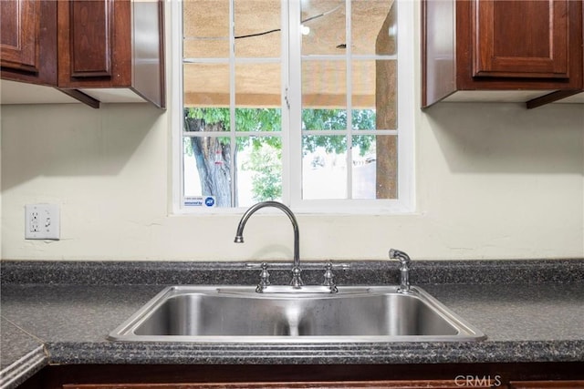 2616 Lynwood St, Bakersfield, CA 93306 - kitchen view of a sink and dark countertops