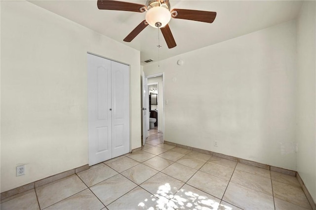 2616 Lynwood St, Bakersfield, CA 93306 - unfurnished bedroom with a closet, light tile patterned floors, and ceiling fan