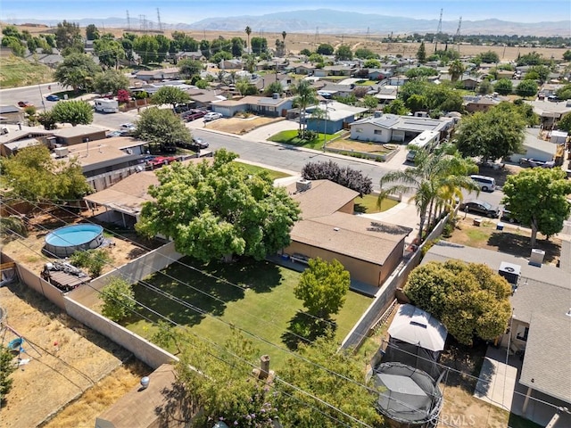 2616 Lynwood St, Bakersfield, CA 93306 - aerial perspective of suburban area with a mountain backdrop