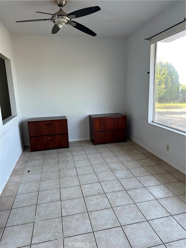 6896 Frontage Rd, Lucerne, CA 95458 - empty room with a ceiling fan and light tile patterned floors