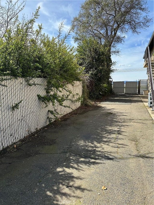 6896 Frontage Rd, Lucerne, CA 95458 - view of road featuring a gate