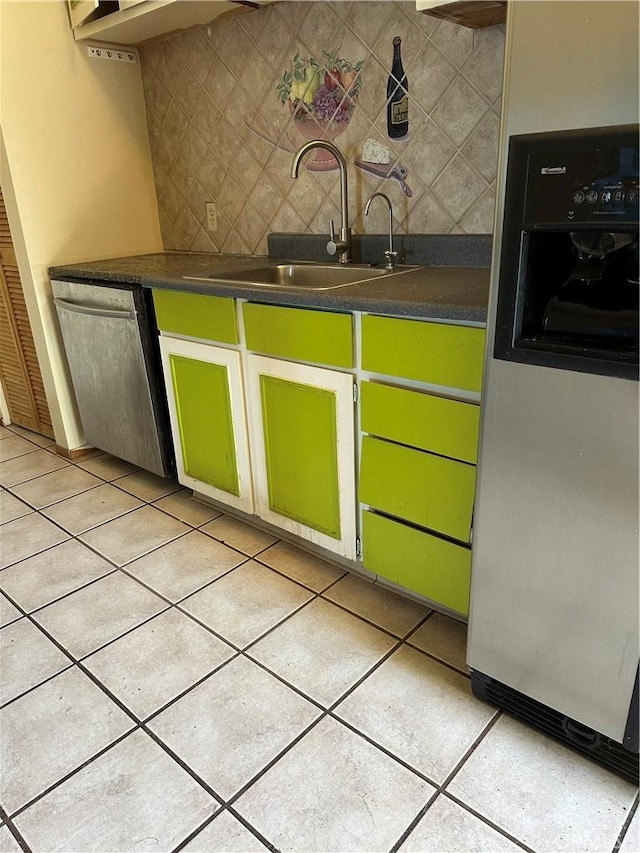 6896 Frontage Rd, Lucerne, CA 95458 - kitchen featuring dishwasher, refrigerator with ice dispenser, dark countertops, and light tile patterned floors