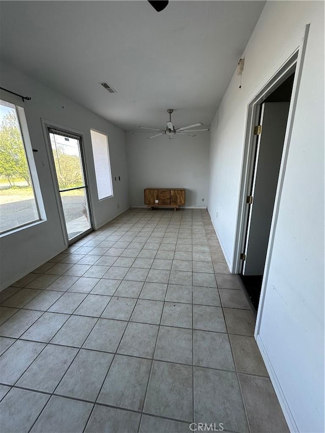 6896 Frontage Rd, Lucerne, CA 95458 - unfurnished living room featuring light tile patterned floors and ceiling fan