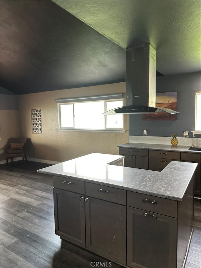 6896 Frontage Rd, Lucerne, CA 95458 - kitchen featuring island exhaust hood, dark wood finished floors, a center island, and lofted ceiling
