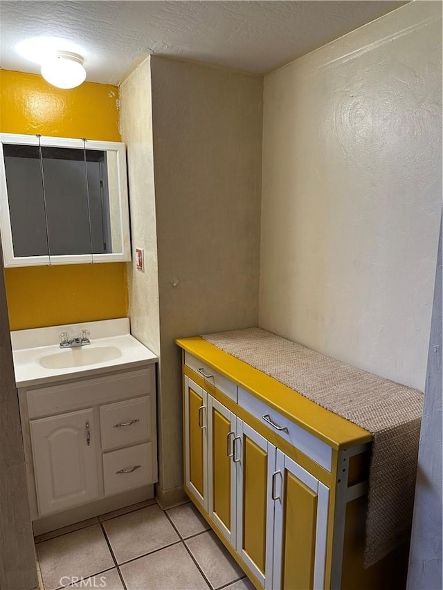 6896 Frontage Rd, Lucerne, CA 95458 - bathroom with vanity, tile patterned floors, and a textured wall
