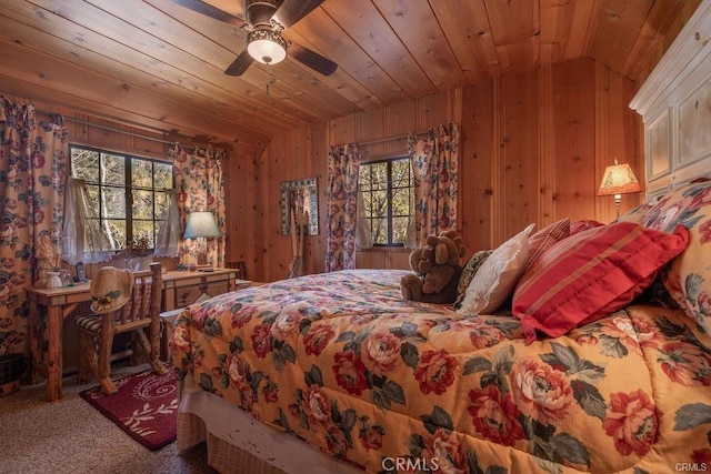 39654 Flicker Rd, Fawnskin, CA 92333 - bedroom with wooden ceiling, lofted ceiling, carpet flooring, multiple windows, and wood walls