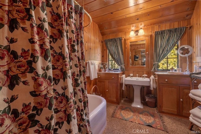 39654 Flicker Rd, Fawnskin, CA 92333 - full bath featuring wooden walls, a tub, lofted ceiling, a shower with curtain, and wood ceiling