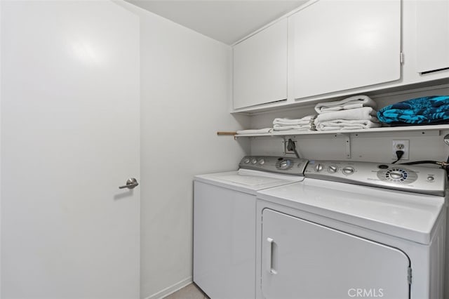 72760 Sage Ct, Palm Desert, CA 92260 - washroom featuring cabinet space and washer and dryer
