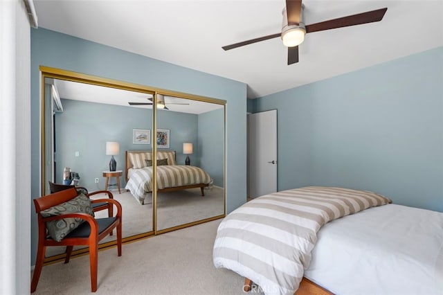 72760 Sage Ct, Palm Desert, CA 92260 - bedroom with light colored carpet, a closet, and a ceiling fan