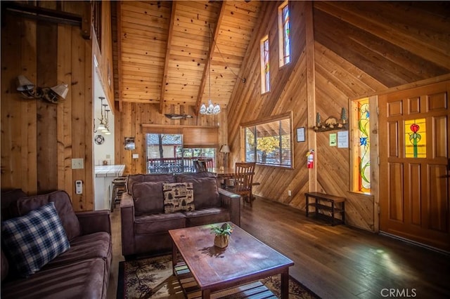1126 Aleutian Dr, Lake Arrowhead, CA 92352 - living room with wood walls, wood finished floors, high vaulted ceiling, a wood ceiling with exposed beams, and a chandelier