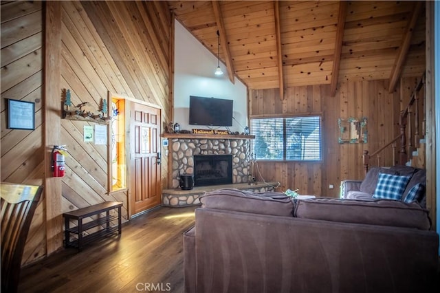 1126 Aleutian Dr, Lake Arrowhead, CA 92352 - living room featuring wooden ceiling, hardwood / wood-style floors, wood walls, and a stone fireplace