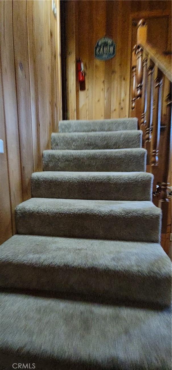 1126 Aleutian Dr, Lake Arrowhead, CA 92352 - staircase with wooden walls
