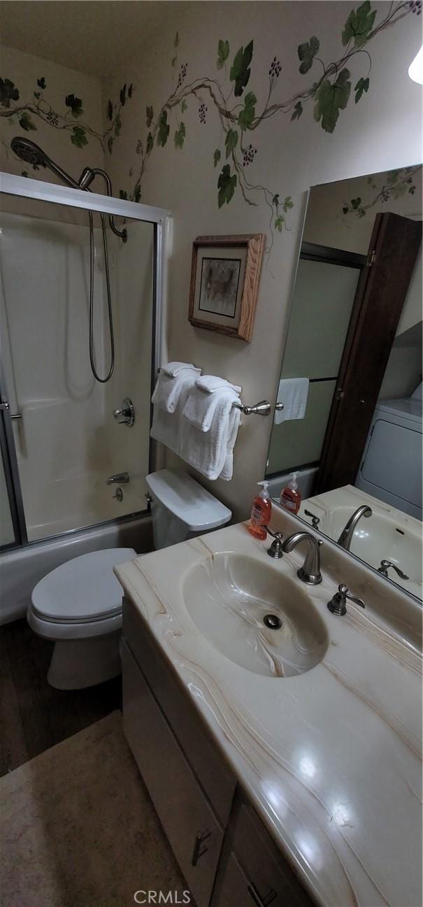 1126 Aleutian Dr, Lake Arrowhead, CA 92352 - bathroom featuring vanity, combined bath / shower with glass door, and wood finished floors
