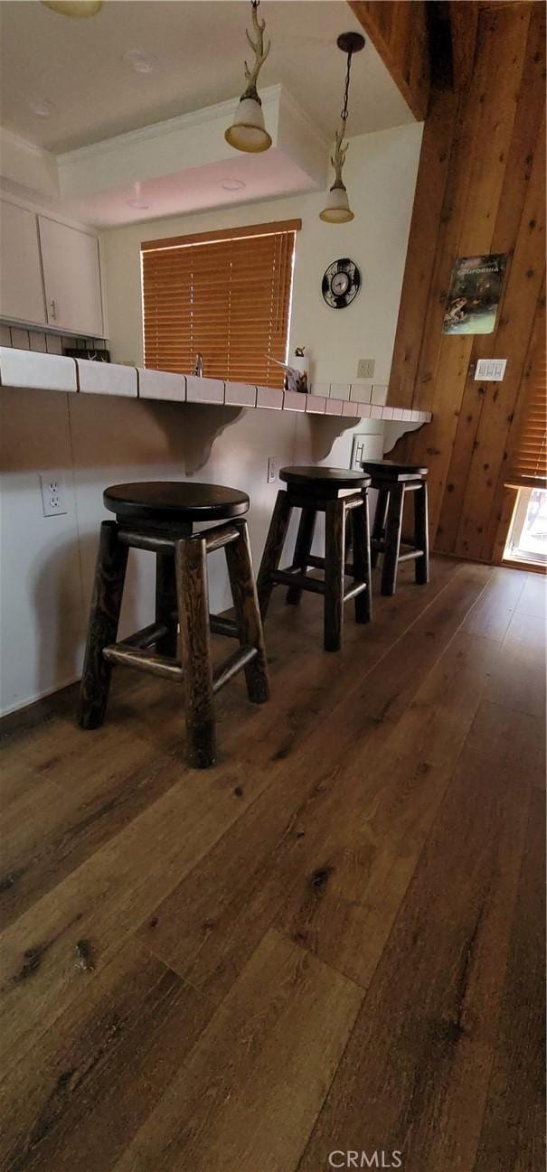 1126 Aleutian Dr, Lake Arrowhead, CA 92352 - dining area featuring dark wood-style floors and wooden walls