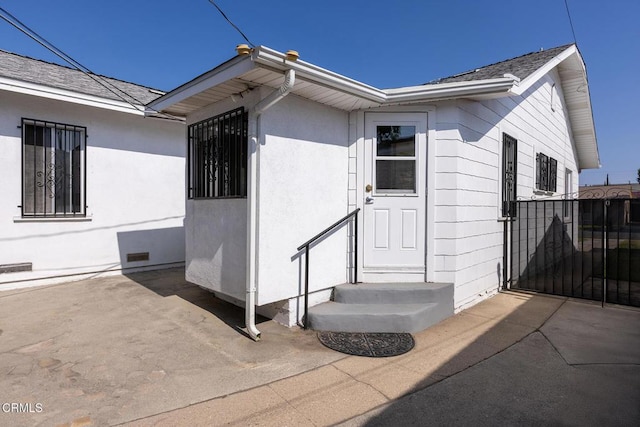 2710 W Shorb St, Alhambra, CA 91803 - view of exterior entry with roof with shingles and a patio area