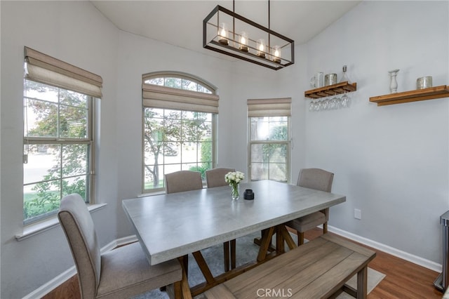 2925 E El Paso Ave, Fresno, CA 93720 - dining room with wood finished floors and a chandelier