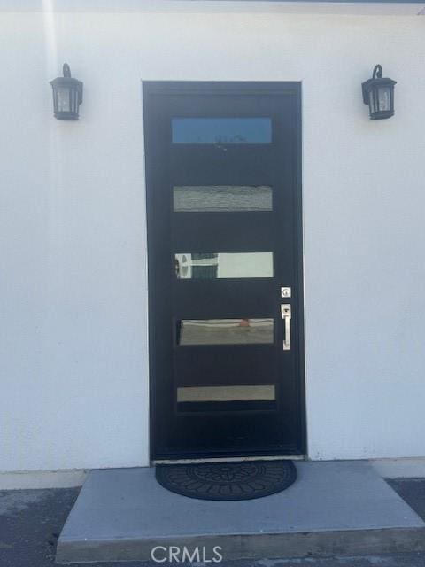 7820 Fulton Ave, North Hollywood, CA 91605 - property entrance with stucco siding