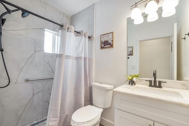 7820 Fulton Ave, North Hollywood, CA 91605 - bathroom featuring vanity and a marble finish shower