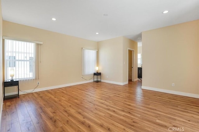7820 Fulton Ave, North Hollywood, CA 91605 - empty room with plenty of natural light, light wood-style floors, and recessed lighting