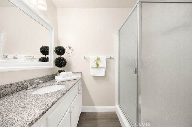 3020 Associated Rd Unit 110, Fullerton, CA 92835 - full bath featuring vanity, wood finished floors, and a stall shower