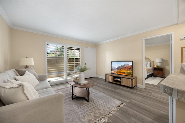 3020 Associated Rd Unit 110, Fullerton, CA 92835 - living room featuring wood finished floors and ornamental molding