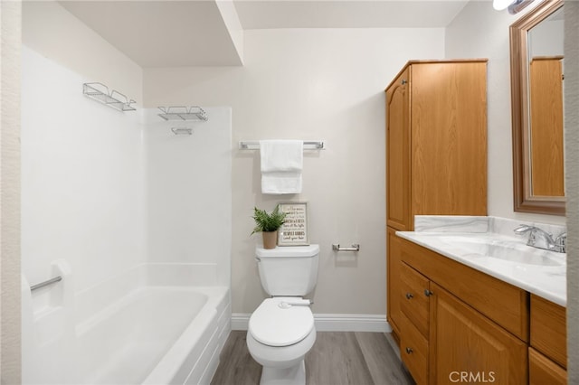 3020 Associated Rd Unit 110, Fullerton, CA 92835 - bathroom featuring vanity, wood finished floors, and washtub / shower combination