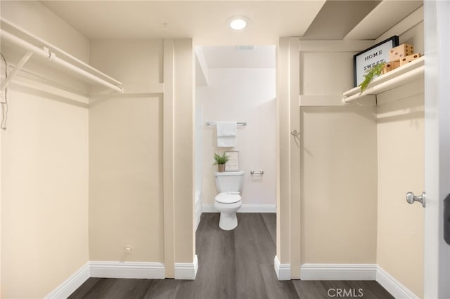 3020 Associated Rd Unit 110, Fullerton, CA 92835 - spacious closet with dark wood-type flooring