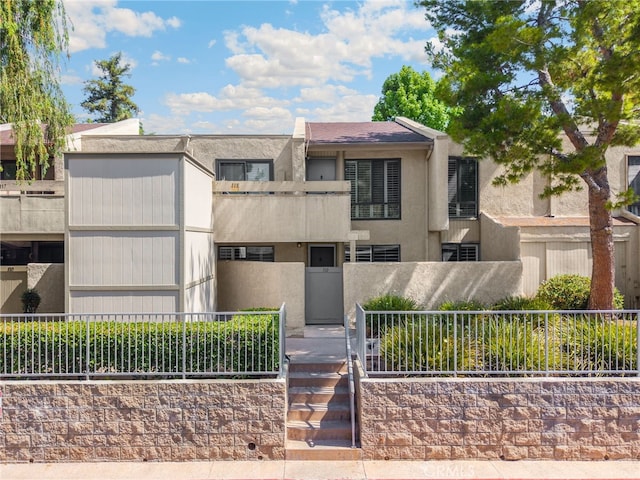 3020 Associated Rd Unit 110, Fullerton, CA 92835 - view of front of property featuring stucco siding