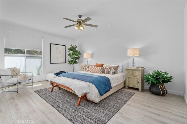 4949 Genesta Ave Unit 102, Encino, CA 91316 - bedroom with light wood finished floors and a ceiling fan