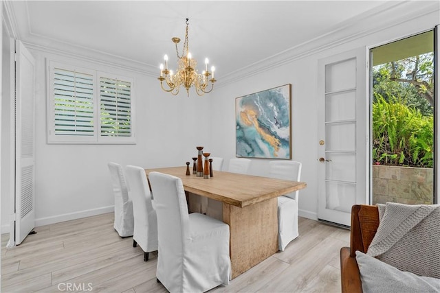 4949 Genesta Ave Unit 102, Encino, CA 91316 - dining room with a chandelier, light wood-type flooring, and ornamental molding