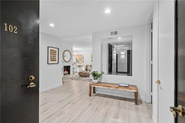 4949 Genesta Ave Unit 102, Encino, CA 91316 - hall featuring wood finished floors and recessed lighting