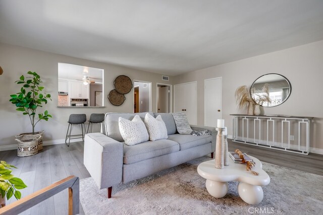 1354 Shadow Ln Unit 102, Fullerton, CA 92831 - living room featuring wood finished floors