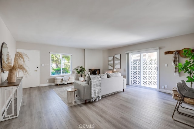 1354 Shadow Ln Unit 102, Fullerton, CA 92831 - living room featuring wood finished floors and baseboards