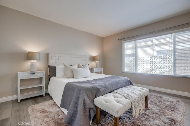 1354 Shadow Ln Unit 102, Fullerton, CA 92831 - bedroom featuring wood finished floors and baseboards