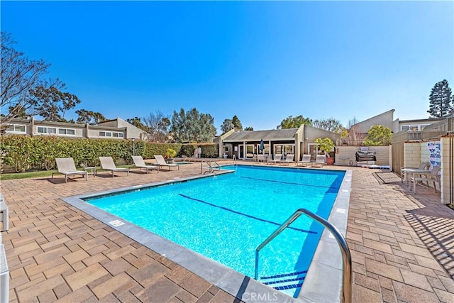 18714 Maplewood Cir, Huntington Beach, CA 92646 - community pool featuring a patio