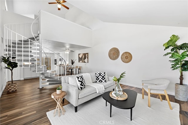 18714 Maplewood Cir, Huntington Beach, CA 92646 - living room featuring a ceiling fan, stairs, wood finished floors, and high vaulted ceiling