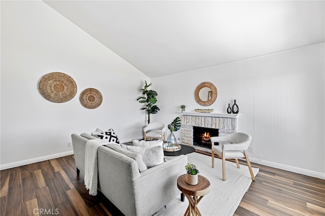 18714 Maplewood Cir, Huntington Beach, CA 92646 - living area featuring wood finished floors, a fireplace, and lofted ceiling