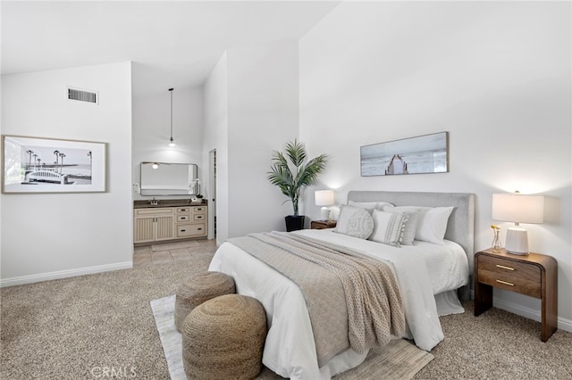 18714 Maplewood Cir, Huntington Beach, CA 92646 - bedroom featuring light colored carpet, high vaulted ceiling, and ensuite bath