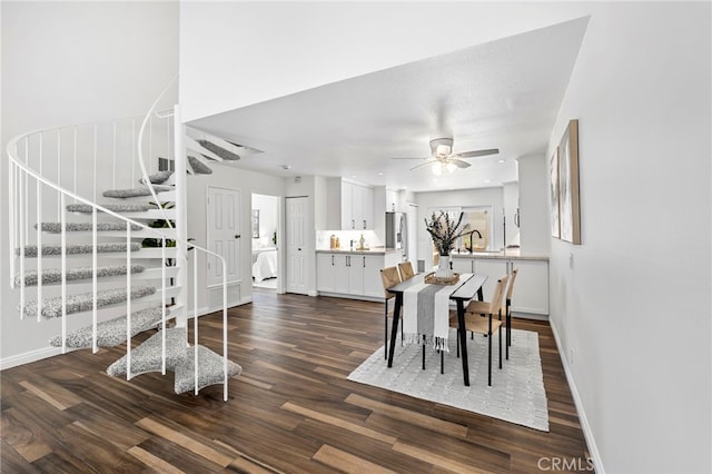 18714 Maplewood Cir, Huntington Beach, CA 92646 - dining space featuring stairs, dark wood-type flooring, and ceiling fan