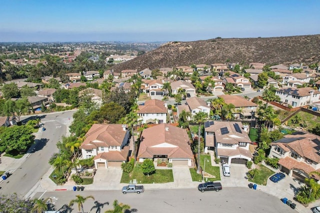 568 Scenic Trail Pl, Chula Vista, CA 91914 - aerial overview of property's location with nearby suburban area and a mountain backdrop