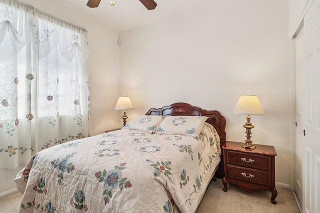 568 Scenic Trail Pl, Chula Vista, CA 91914 - bedroom with light colored carpet, a closet, and a ceiling fan