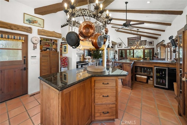 665 Sheehy Rd, Nipomo, CA 93444 - kitchen featuring beverage cooler, a ceiling fan, a chandelier, a kitchen island, and light tile patterned flooring