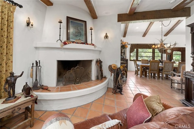 665 Sheehy Rd, Nipomo, CA 93444 - living room with a fireplace, beam ceiling, a chandelier, and tile patterned flooring