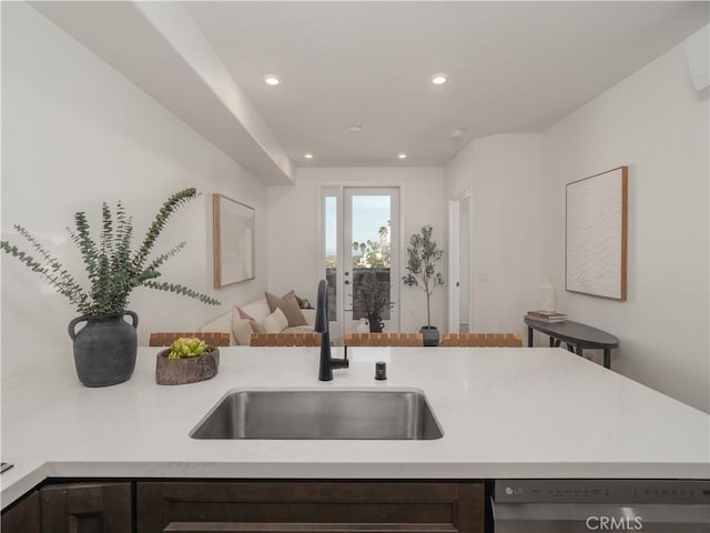 402 W Grand Ave Unit 104, Grover Beach, CA 93433 - kitchen featuring dark brown cabinetry, dishwasher, light countertops, and recessed lighting